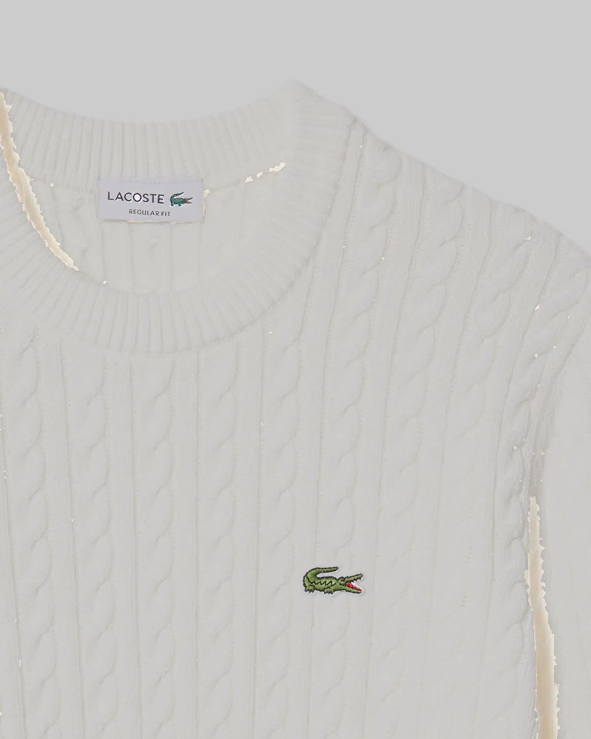 Pull torsadé coton Lacoste blanc, détail de la maille torsadée