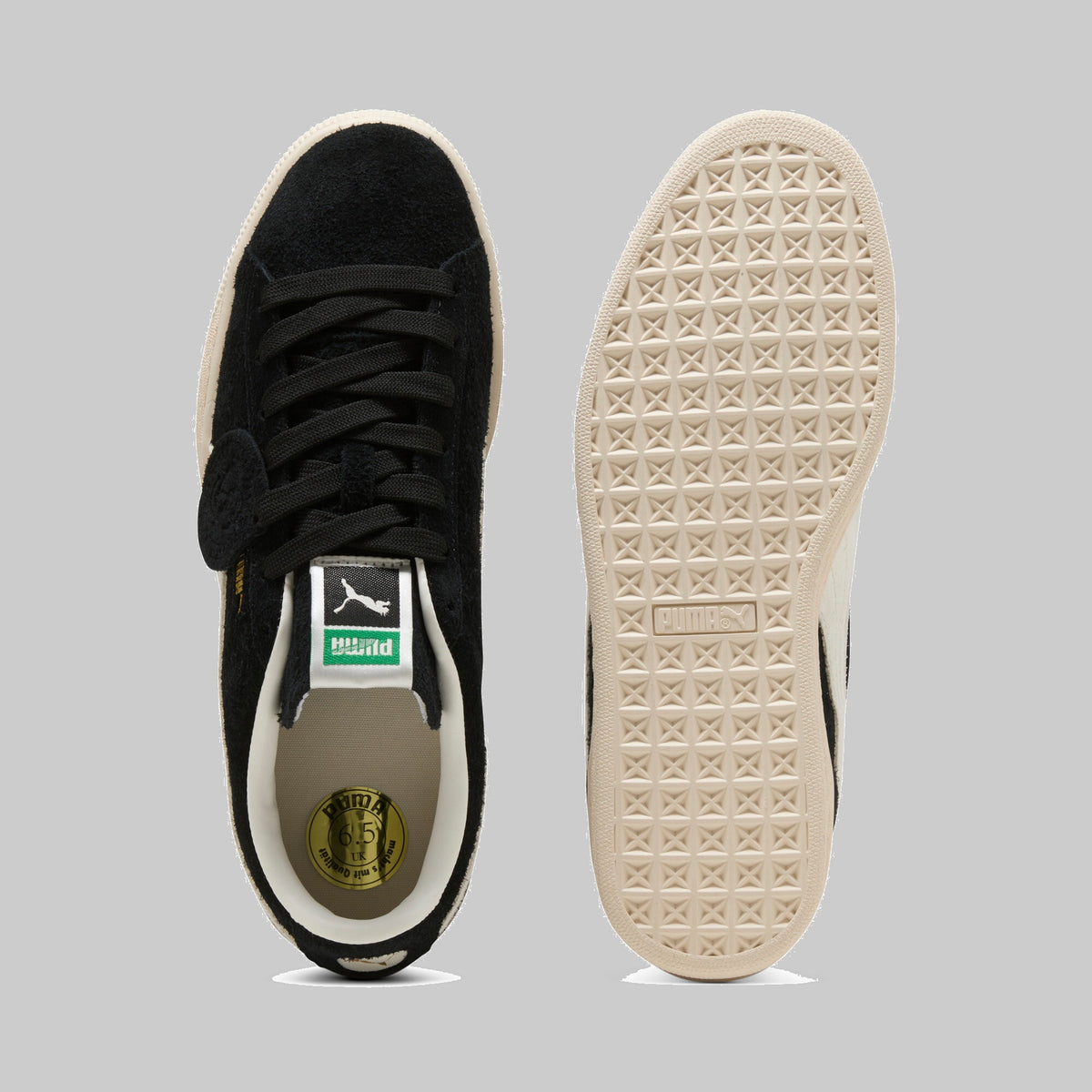 Sneakers Puma Suede Charles F. Stead noires, vue de dessus et semelle extérieure