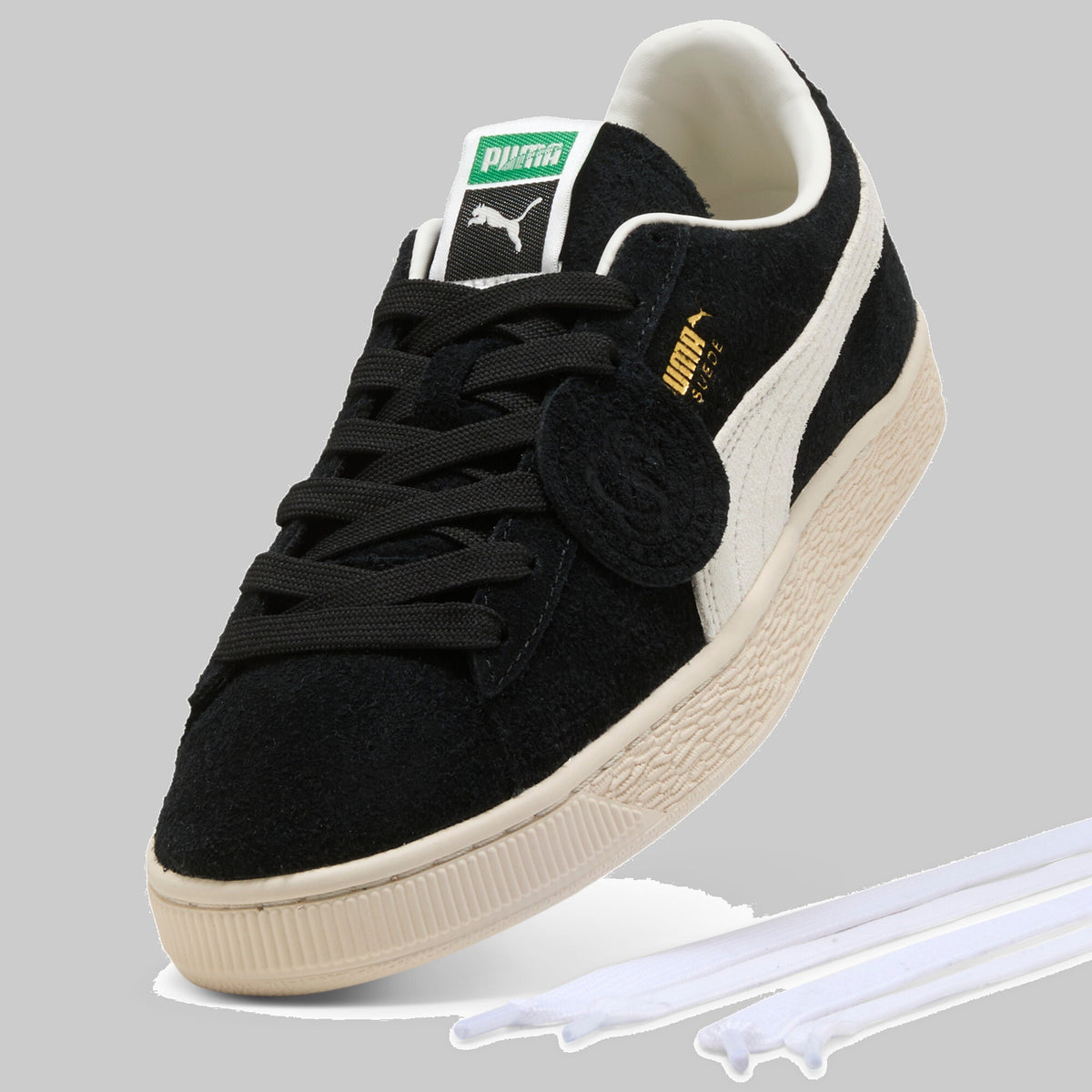 Sneakers Puma Suede Charles F. Stead noires avec le deuxième jeu de lacets fourni